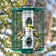 Heavy-Duty Mixed Seed bird feeder with a protective metal cage, allowing birds to feed safely while deterring squirrels, featuring six clear feeding ports and a sturdy seed tray.