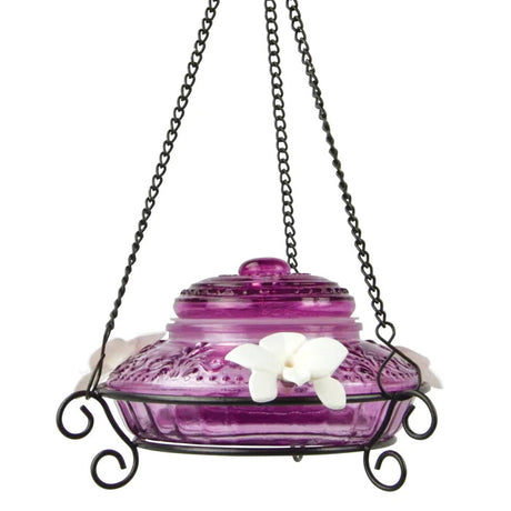 Nature's Way Antique Top-Fill Glass Hummingbird Feeder with white flower ports, hanging on a chain, ideal for gardens.