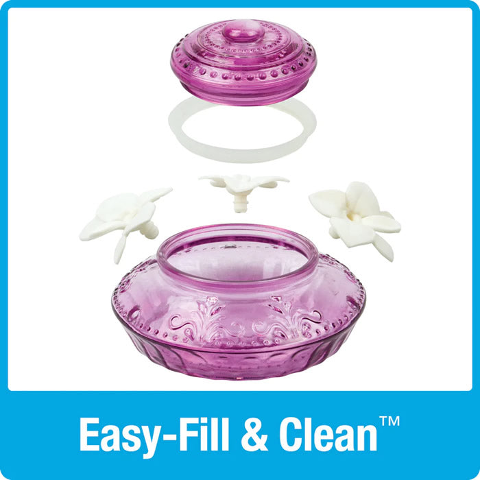 Nature's Way Antique Top-Fill Glass Hummingbird Feeder with three lifelike flower ports, removable flowers, and a decorative glass container for easy cleaning and leak-free feeding.