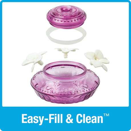 Nature's Way Antique Top-Fill Glass Hummingbird Feeder with three lifelike flower ports, removable flowers, and a decorative glass container for easy cleaning and leak-free feeding.