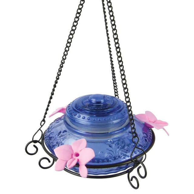 Nature's Way Illuminated Antique Top-Fill Glass Hummingbird Feeder with pink flowers, solar LED light, and three flexible flower ports for feeding.