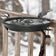 Heated Bird Bath Clamp Mount with a built-in heater and power cord, featuring two winter songbirds on its rim against a snowy backdrop.