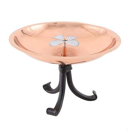 Dogwood Bird Bath with Tripod Stand featuring a copper bowl and dogwood blossom, ideal for birds and pollinators. Sturdy wrought iron stand included.