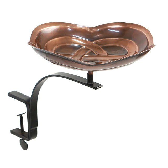 Dara Knot Bird Bath with Rail Mount Bracket: A metal bowl on a metal stand, featuring intricate Celtic designs, perfect for deck railing birdwatching.