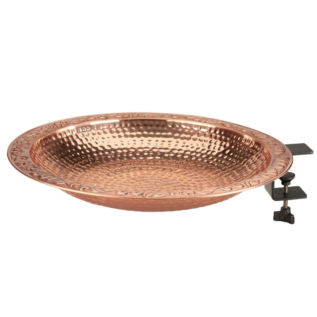 A hammered copper deck-mounted sink bowl with a decorative embossed rim and a black clamp bracket on the right side, shown against a plain white background.