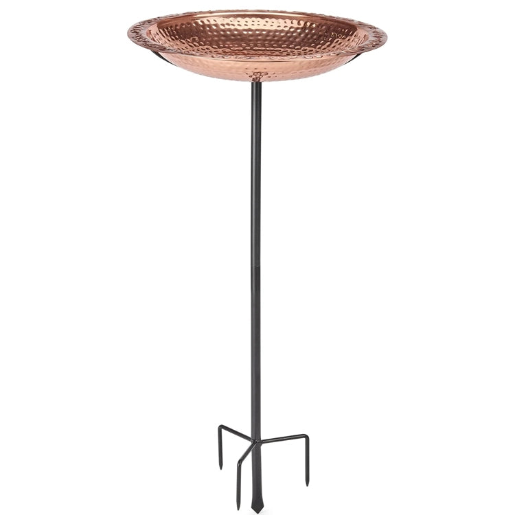 A hammered copper bird bath with a black metal stand, shown against a plain white background.