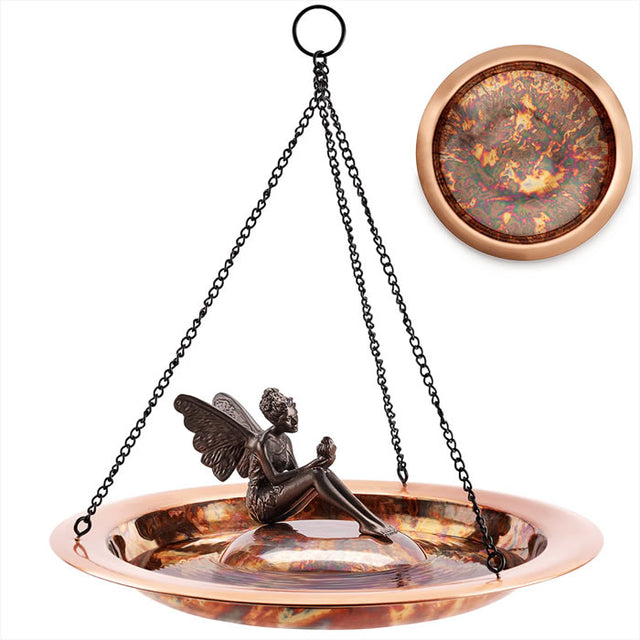 Hanging Fired Copper Bird Bath with Fairy featuring a winged fairy statue sitting on an 18 artisan-hammered copper bowl, equipped with a durable hanging chain.