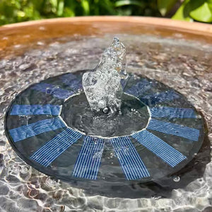 Quackups Replacement Solar Pump in a water fountain, features a solar panel for bird baths, designed for outdoor use, requires full sunlight.