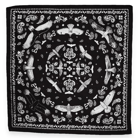 Bird Collective Hawks In Flight Bandana featuring black fabric with white hawks and paisley patterns, ideal for bird enthusiasts and nature lovers.