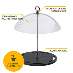 Seed cylinder feeder showing clear polycarbonate dome, metal hanging loop and recycled plastic base.