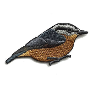 Bird Collective Red-Breasted Nuthatch Patch featuring a detailed embroidered bird, perfect for backpacks or jackets. Iron-on backing; measures 2 x 1.25 inches.