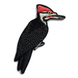 Bird Collective Pileated Woodpecker Patch showcasing a black bird with a red head, intricately embroidered, featuring an iron-on backing for easy attachment to accessories.