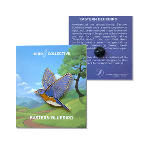 Bird Collective Northern Cardinal or Eastern Bluebird Pin featuring a shiny silver enamel with black rubber clutch backing, perfect for lapels, backpacks, and hats.