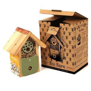 Bee Barn Bee Nester with a sustainable wood structure and recycled plastic frontage, packaged in a box displaying the product image and features for garden pollinators.