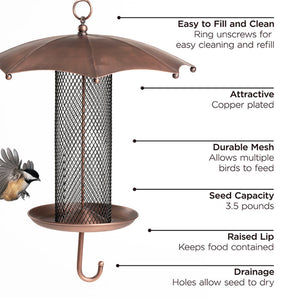 Umbrella Bird Feeder with mesh tube and copper finish, featuring built-in drainage holes. Bird flying near feeder, designed to protect seed from weather.