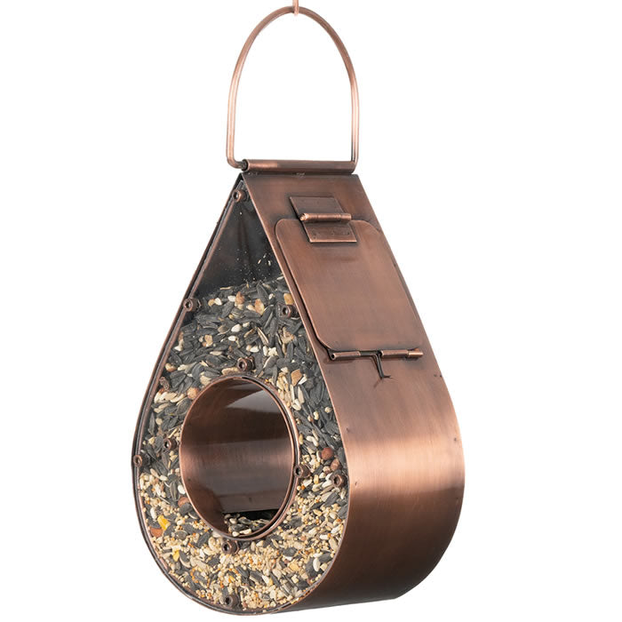 Teardrop Fly-Thru Feeder, Copper: A raindrop-shaped bird feeder with a central perch, heavy-duty plexiglass panels, and a side panel for easy filling. Holds 3 lbs. of seed.