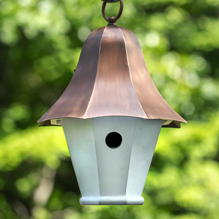 Bell Top Bird House with a durable copper roof, hanging from a chain, designed for small songbirds. Features easy cleanout and built-in ventilation.