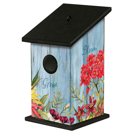 Bloom with Grace Birdhouse featuring floral artwork, metal portal protector, and fledgling ladder. Durable all-weather PVC and recycled plastic construction, 7x7x12.25 inches tall.