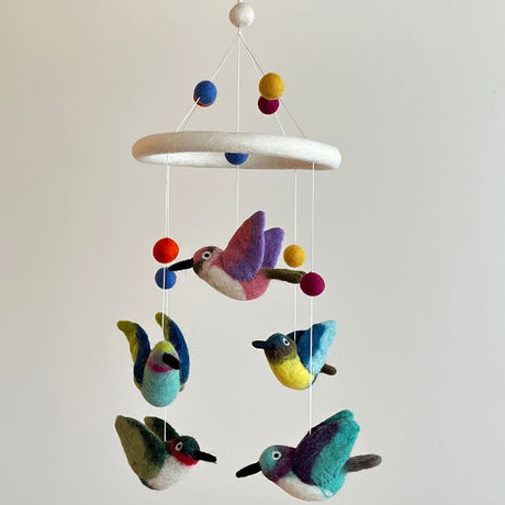 Felt Hummingbird Mobile featuring handcrafted felt birds hanging on strings, perfect for adding a whimsical touch to your nursery or living room.