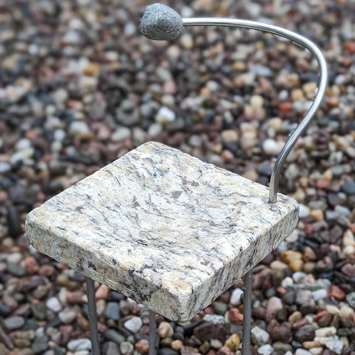 Birds & Bees Bird Bath made from reclaimed granite with a natural stone finial, includes three rustproof aluminum legs for stability, perfect for hummingbirds, butterflies, and bees.