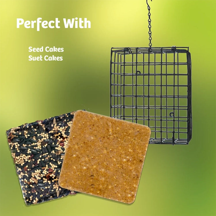 A square black metal hanging bird feeder shown with two seed cakes: one filled with mixed birdseed and one plain tan. White text on a green gradient background reads 'Perfect With Seed Cakes Suet Cakes.