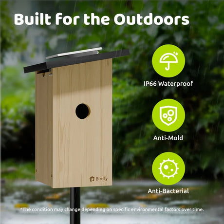 Birdfy Ebony Nest Birdhouse with Camera on a post in rain, highlighting IP66 waterproof, anti-mold, and anti-bacterial features, designed for outdoor durability.