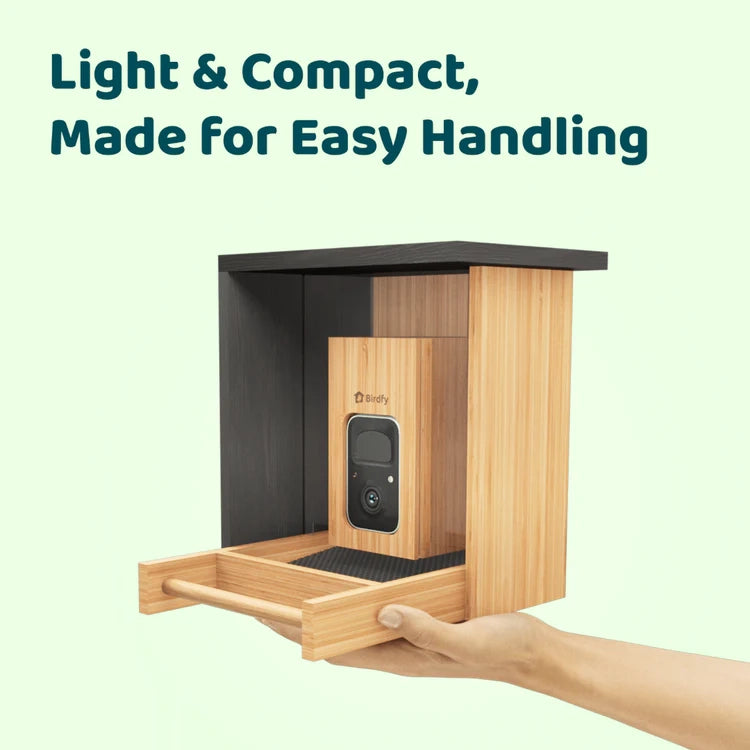 Birdfy Mini Bamboo Bird Feeder with Camera shown as lightweight, featuring a pull-out tray and built-in camera, ideal for easy handling and birdwatching.