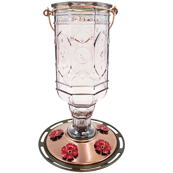 Amethyst Jewel Hummingbird Feeder: Glass container with red flower-shaped feeding ports, embossed hummingbirds, bronze base, and metal hanger.