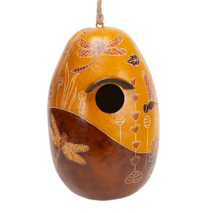 Dragonfly Gourd Birdhouse with a 1-1/4 inch hole, showcasing intricate dragonfly designs, natural gourd shape, and ready to hang.