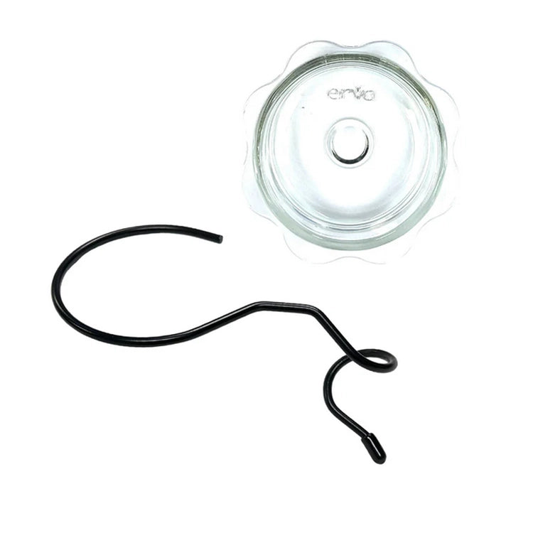 Glass lid with a black handle on a white background