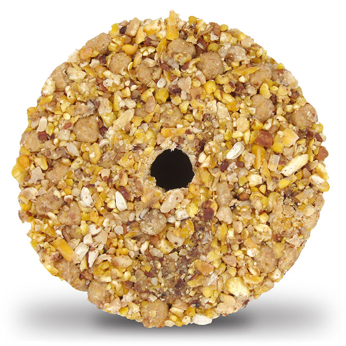 Close-up of Woodpecker Snak™ with Peanut Nuggets™ Stak'em, set of 4, showcasing the stackable donut-shaped bird snacks filled with seeds and suet.