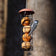 Suet Ball Feeder with a songbird clinging, pecking at fat-and-seed balls. Holds four balls, easy to refill and clean.