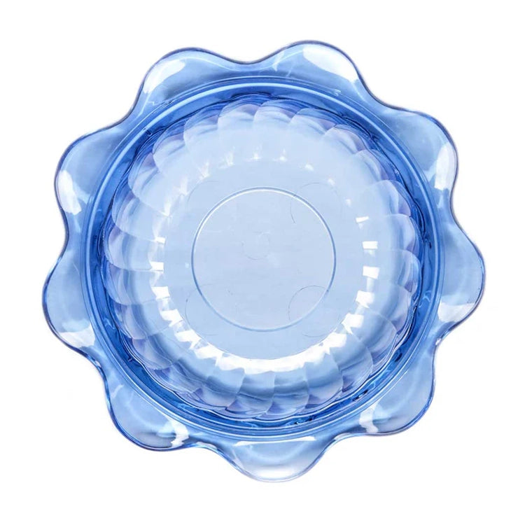Blue plastic lid with floral design on a white background
