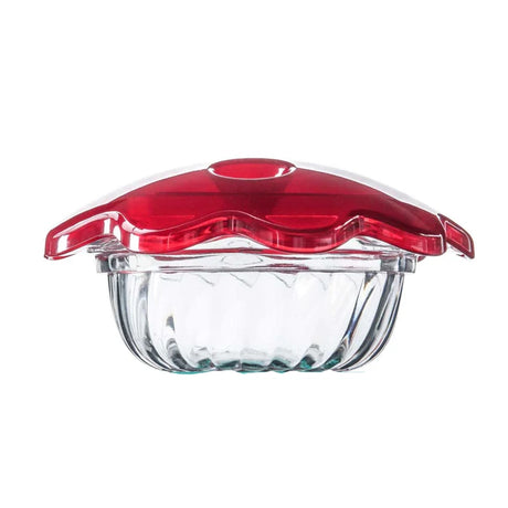 Clear glass container with a red lid on a white background