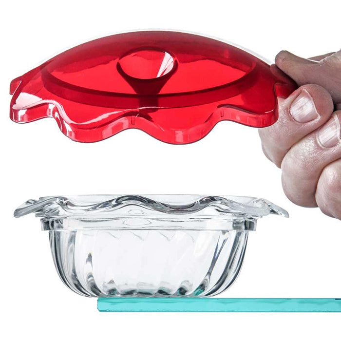 Hand holding Hummingbird Clear Cup with Red Top, featuring a decorative, clear plastic dish, ideal for viewing nectar levels in select feeders.