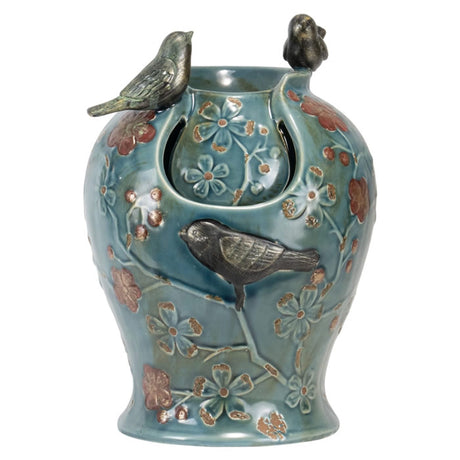 Blue Verdigris Songbird Fountain with two birds perched on rim, floral details, and LED-lit cascading water, creating a tranquil atmosphere for any tabletop.