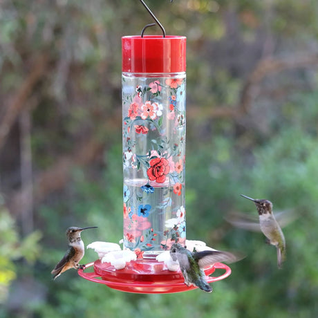 Vintage Blossom Decorative Glass Hummingbird Feeder with six flower-shaped feeding ports, continuous perch ring, and twist-off base, attracting hummingbirds to your yard.