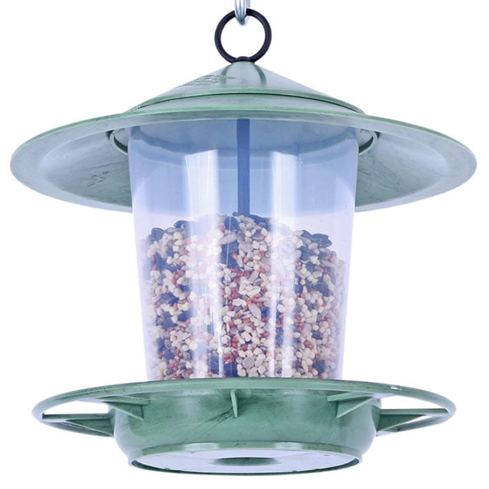 Eco Beacon Bird Feeder with a clear container filled with seeds, made from recycled plastic, featuring an easy-to-open lid for simple refilling and cleaning.