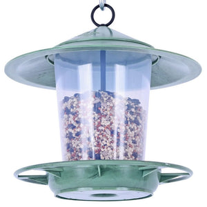 Eco Beacon Bird Feeder with a clear container filled with seeds, made from recycled plastic, featuring an easy-to-open lid for simple refilling and cleaning.