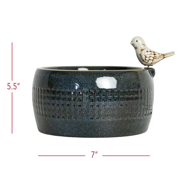 Elloise LED Bird Fountain: A ceramic bowl with a distressed white bird perched on the edge, featuring an embossed plaid pattern and LED-lit bubbling water.