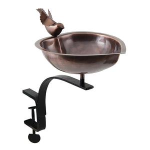 Heart Shaped Bird Bath with Rail Mount Bracket showing a bird perched on the heart-shaped basin. Ideal for easy bird watching on your deck.