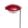 Hummingbird Plant Stick featuring a red flower-shaped gem and clear plastic dish on an 18-inch black metal stake for easy garden placement.