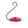 Red hummingbird feeder with a black hook on a white background