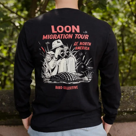 Loons of North America Sweatshirt, Charcoal, featuring a birdwatcher and loon design, LOON MIGRATION TOUR, highlighting its cotton comfort and birdwatching theme.