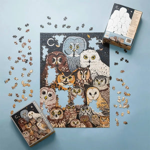 Jigsaw puzzle with owl design on a blue background