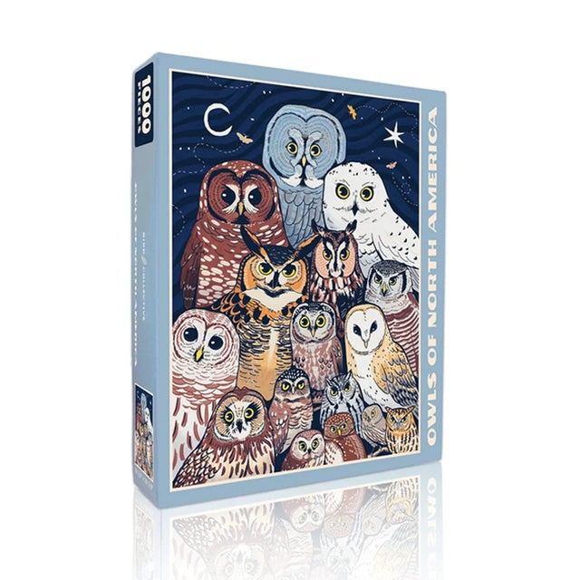 Jigsaw puzzle box featuring illustrations of owls with a starry night background
