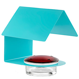 The Cottage Hummingbird Feeder Aqua, featuring a sturdy blue container with a red glass lid, mounted on a steel frame with multiple feeding ports.