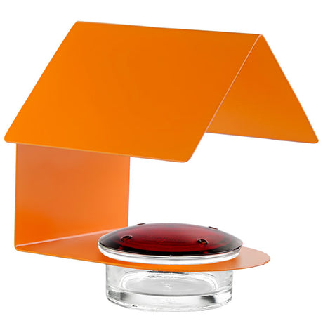 The Cottage Hummingbird Feeder Orange features a sturdy metal frame, red glass lid with four feeding ports, and a clear glass dish for easy refilling.