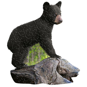 I Am Lil' Cub 100 pc. Puzzle features a bear on a rock, shaped uniquely with large pieces, ideal for ages 5 and up.