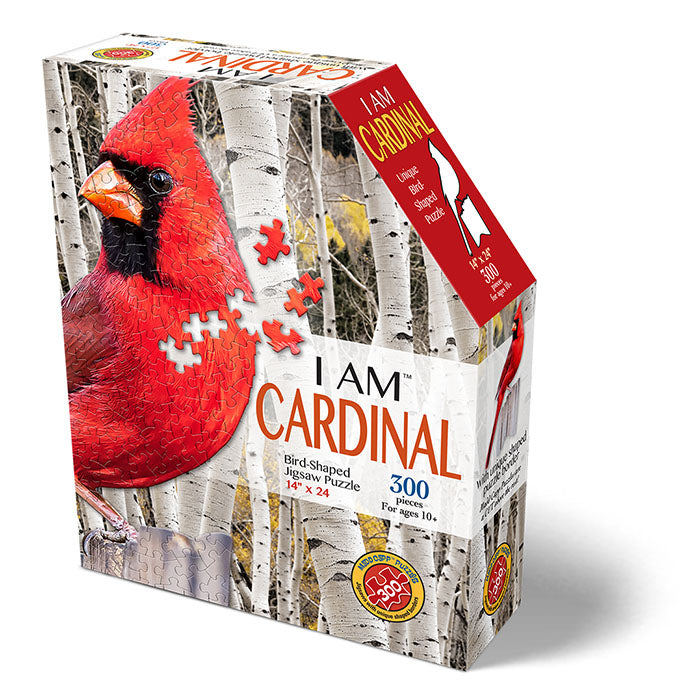 I Am Cardinal 300 pc. Puzzle with a unique, bird-shaped design, featuring a realistic image of a red bird and an educational Madd Capp Fun Facts booklet.